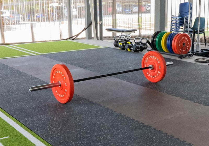 Olympic barbell weight on Heavy Duty Gym Floor Tiles
