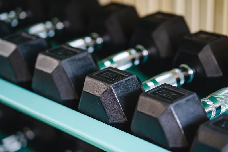 Hex Dumbbells on Gym Rack 