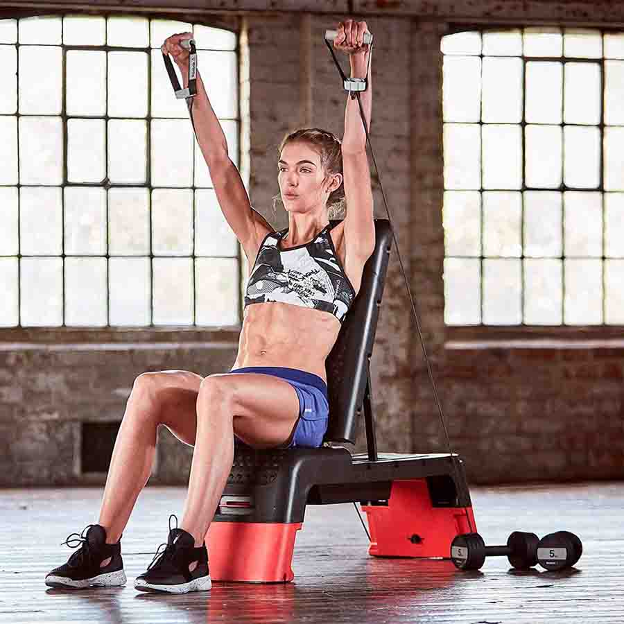 reebok deck step platform, reebok deck in stock, reebok deck for sale, reebok deck dimensions, cardio equipment, home gym equipment, cardio equipment, training at home, cardio, women training at home with dumbbells on reebok deck.